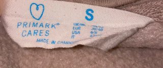 Sudadera beige con bolsillo