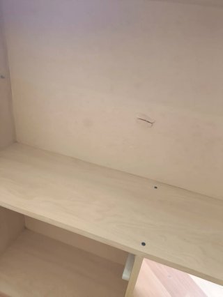 Armario, cabecera y cama de habitación