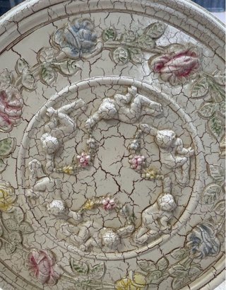 Rosone decorativo con cherubini