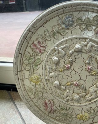 Rosone decorativo con cherubini
