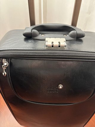 Maleta de piel negra con ruedas 50x40x20