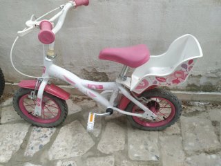 Bicicleta infantil rosa y blanca y de niño de mont