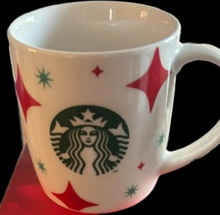 Taza Starbucks Blanca con Estrellas Rojas y Verdes