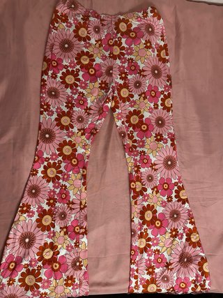Pantalones acampanados florales talle alto