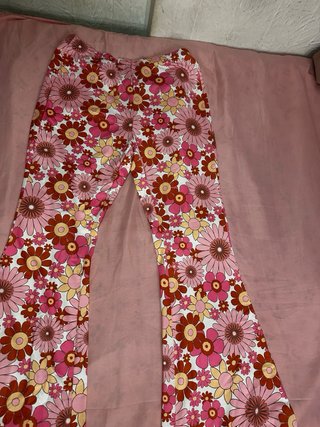 Pantalones acampanados florales talle alto