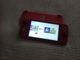 Nintendo Switch Lite Rosa y Amarillo (reparar)