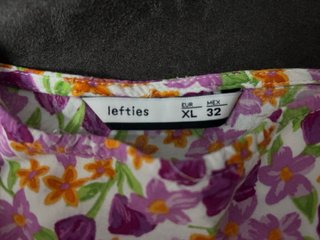 Mono corto floral morado y naranja