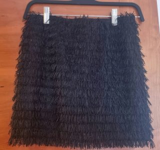 Falda corta negra flecos T38
