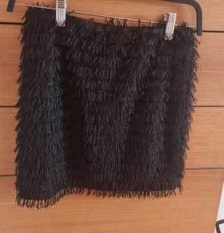 Falda corta negra flecos T38