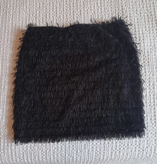 Falda corta negra flecos T38