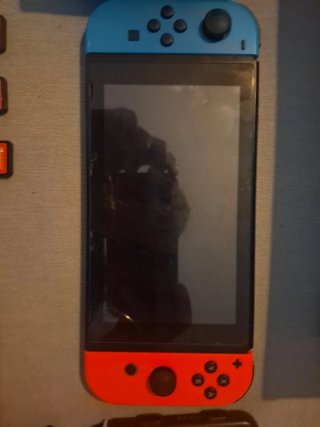 Nintendo Switch con funda y accesorios