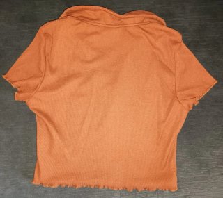 Top naranja SHEIN cuello polo