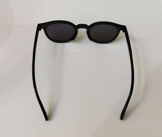 Occhiali da sole neri rotondi