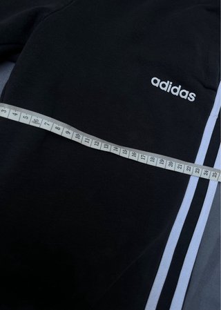 Pantalones Adidas negros con rayas