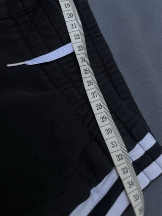 Pantalones Adidas negros con rayas