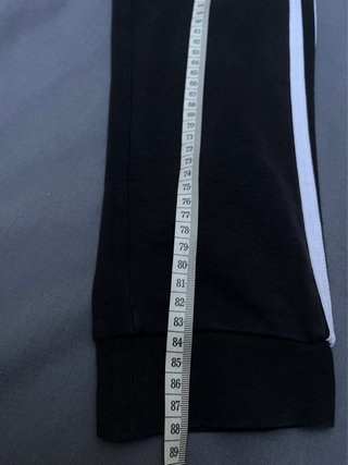 Pantalones Adidas negros con rayas