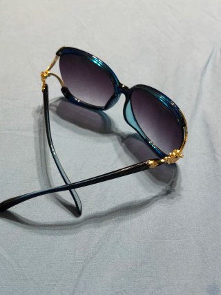 Occhiali da sole oversize blu petrolio e oro