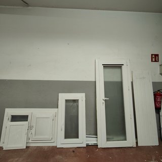 Ventana PVC Blanca con Porticones