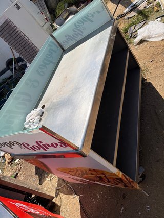 Mesa de acero inoxidable con estantes