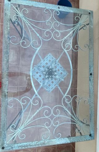 Mesa de jardín cristal y hierro forjado y 5 sillas