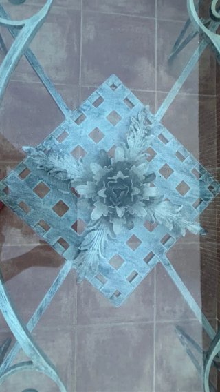 Mesa de jardín cristal y hierro forjado y 5 sillas