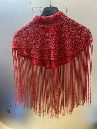 Accesorio de fiesta con flecos