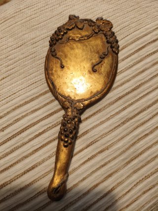 Espejo de mano vintage dorado