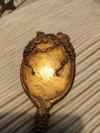 Espejo de mano vintage dorado