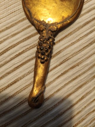 Espejo de mano vintage dorado