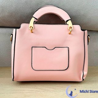 Bolso rosa con monedero gatito