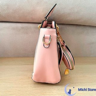 Bolso rosa con monedero gatito