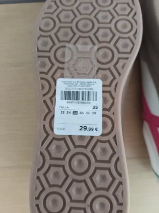 Zapatillas deportivas rosas y blancas