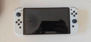 Nintendo Switch OLED + SD, custodia, giochi e supporto