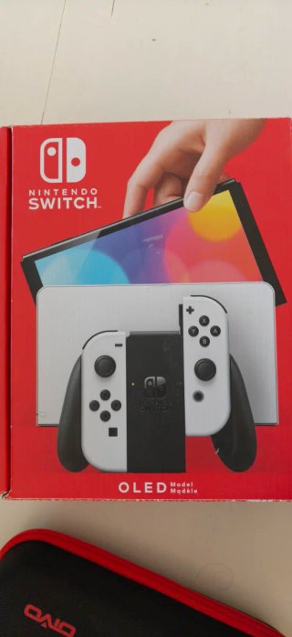 Nintendo Switch OLED + SD, custodia, giochi e supporto
