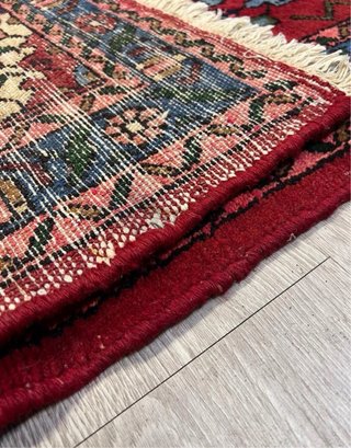 Alfombra persa de lana roja y azul
