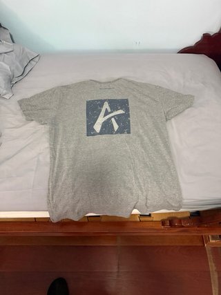 Camiseta Lacoste Negra y Turquesa