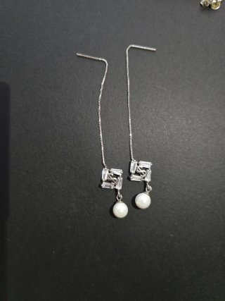Pendientes largos 925 con perla y detalle dólar $