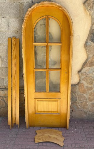 Puerta de pino maciza con cristal