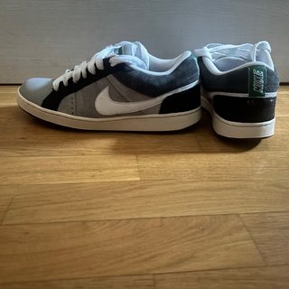 Zapatillas Nike Isolate grises y blancas