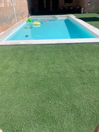 Césped artificial verde