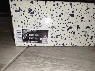 Jordan 4 Retro Nero Grigio Rosso 2019