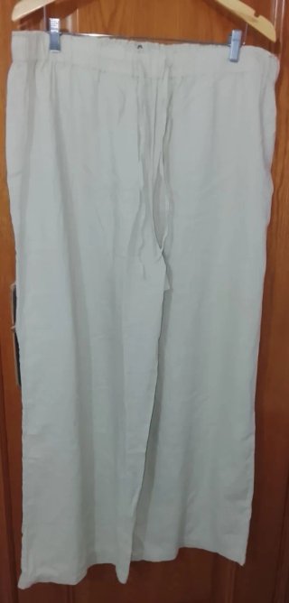 Pantalón de lino beige talla grande y pierna ancha