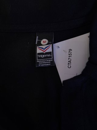 Polo negro Trigema