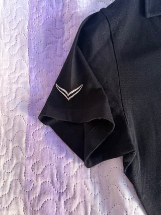 Polo negro Trigema