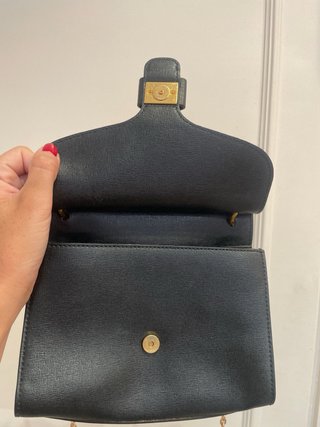 Bolso Coccinelle negro cadena dorada