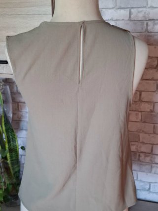 Blusa Zara drapeada con detalle dorado