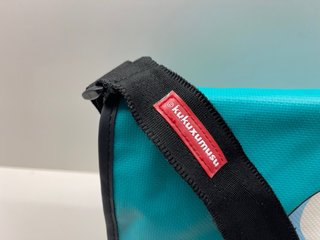 Bandolera Kukuxumusu verde, con Dibujo oso polar