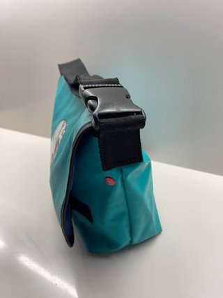 Bandolera Kukuxumusu verde, con Dibujo oso polar
