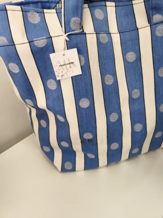 Bolsa de playa y neceser a rayas y lunares