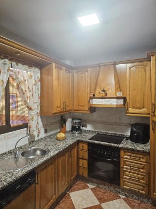 Cocina modular madera roble y granito